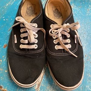 Women’s black Vans size 9.